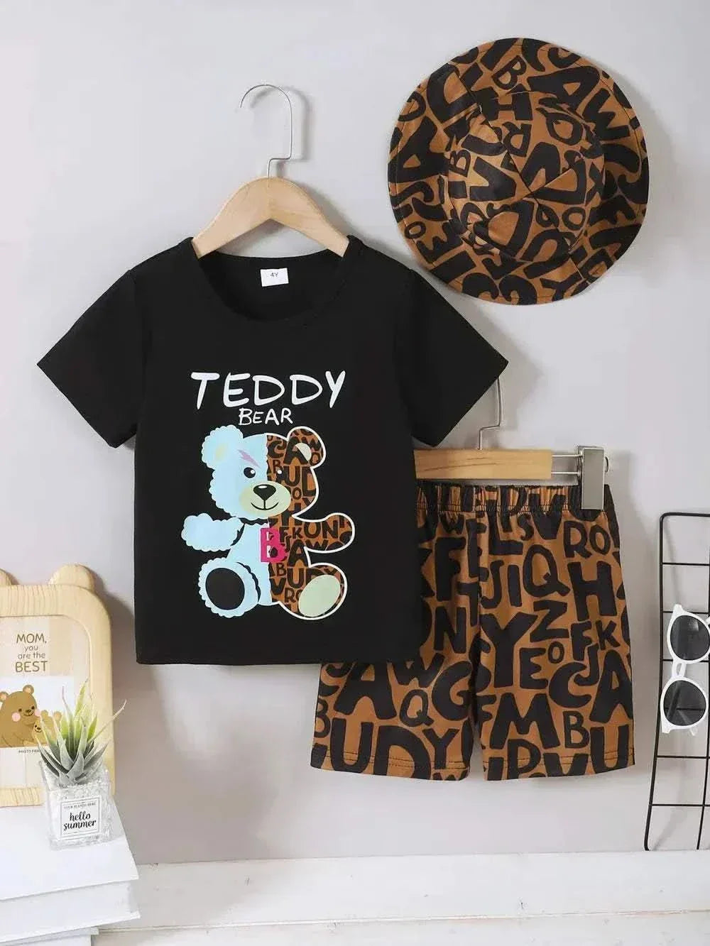 Children's black teddy bear round neck top with brown letter print pants and matching hat set