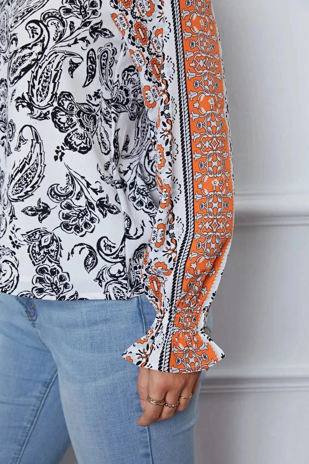 Tassel Tie Neck Printed Smocked Long Sleeve Blouse - VILLA FASHION