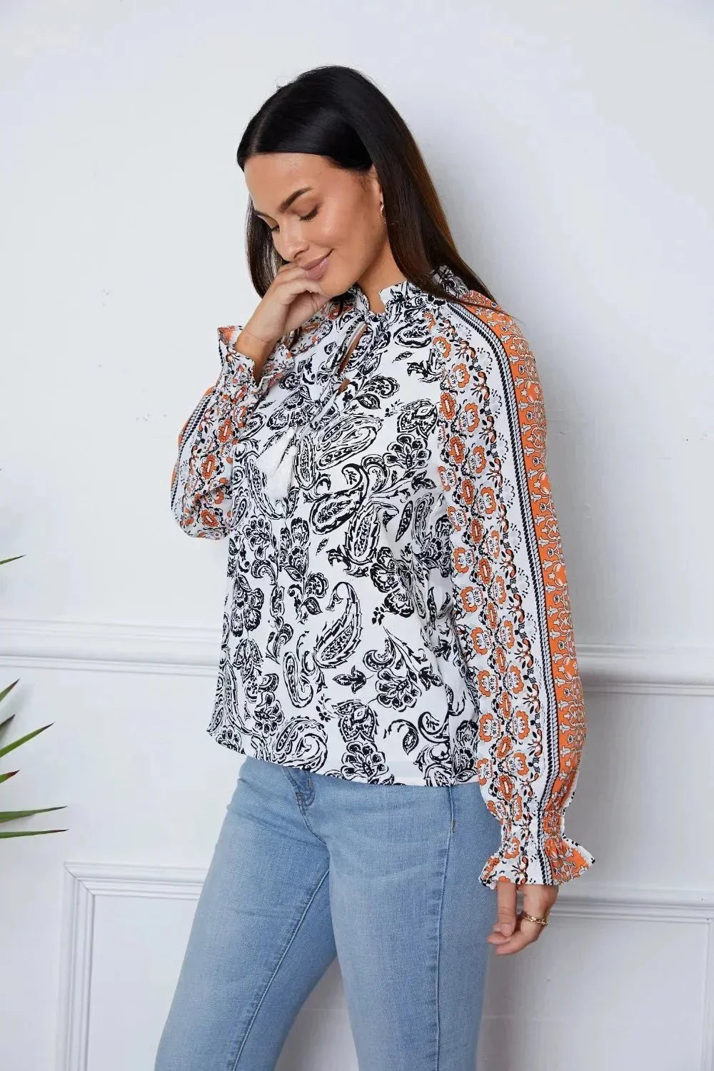 Tassel Tie Neck Printed Smocked Long Sleeve Blouse - VILLA FASHION