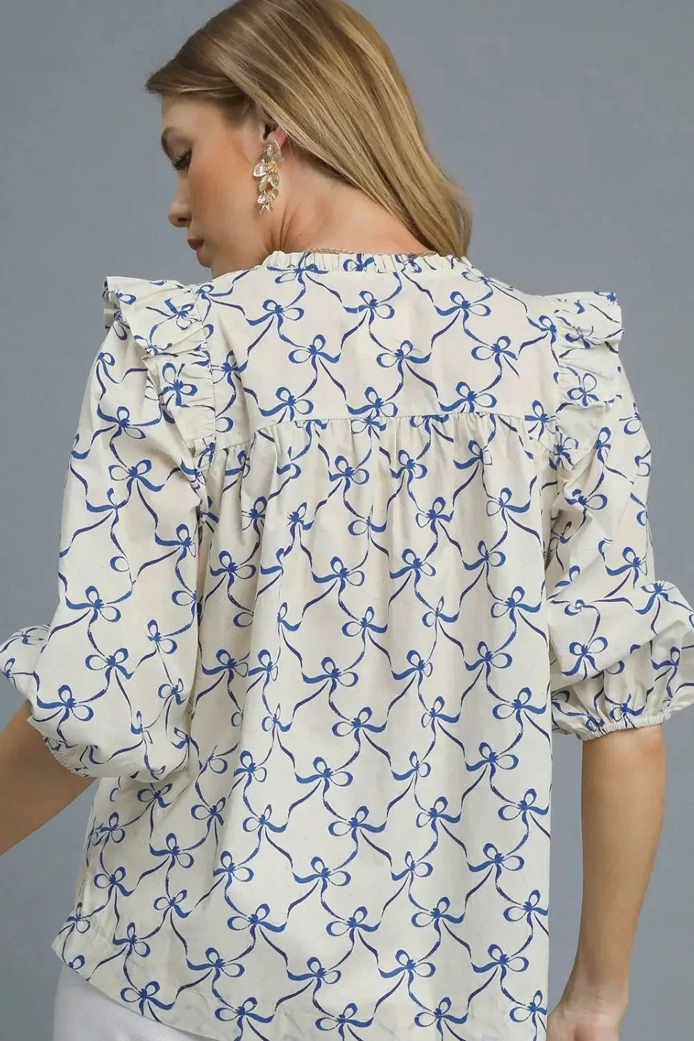 Umgee Ruffled Bow Print Notched Blouse - VILLA FASHION