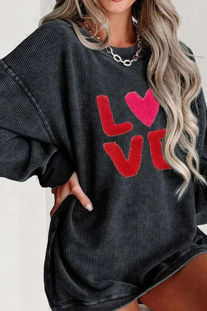 Black Valentine’s Day LOVE round neck long sleeve sweatshirt with red and pink letters and slightly stretchy polyester fabric