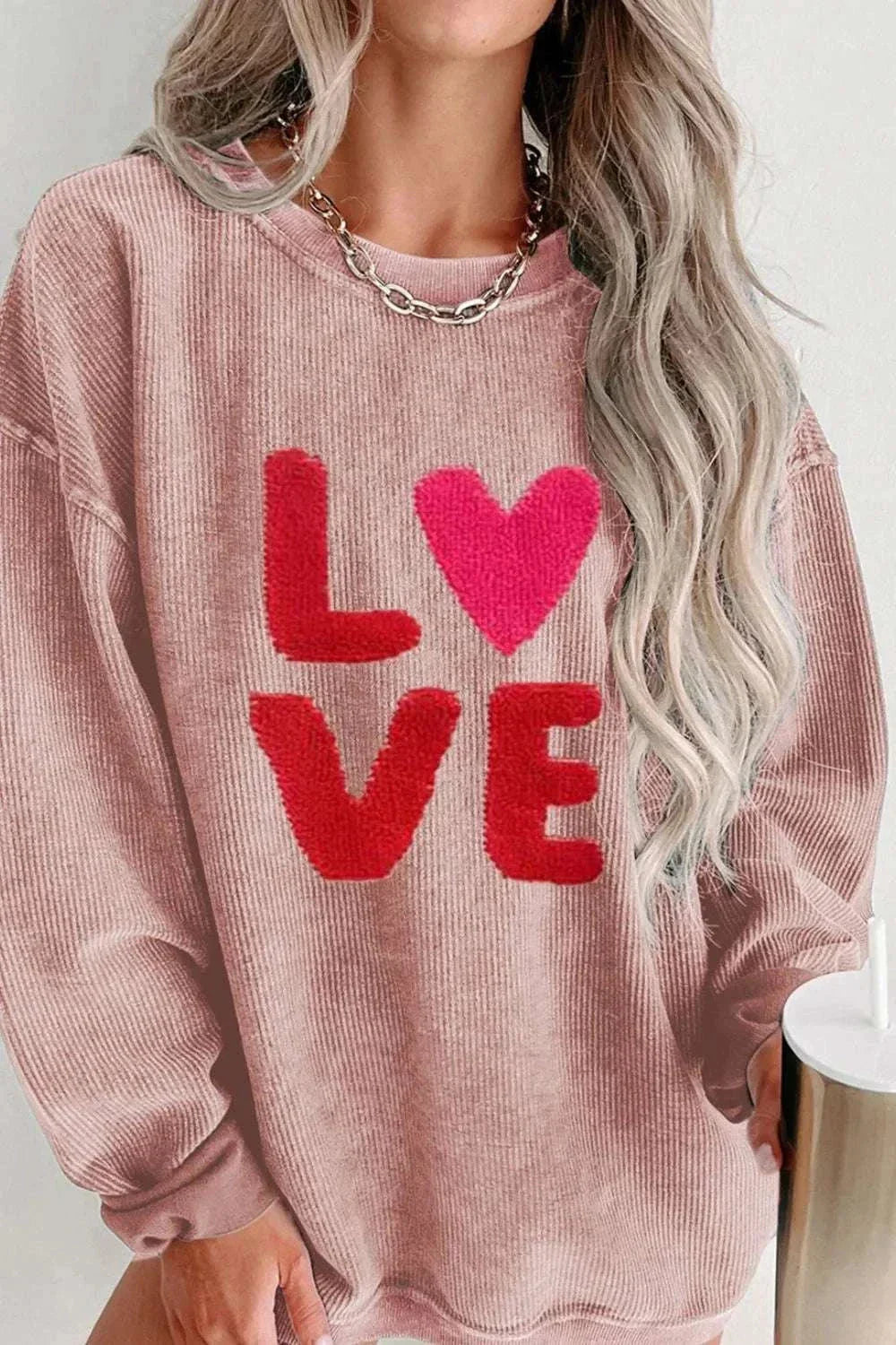 Valentine’s Day LOVE pink round neck long sleeve sweatshirt with red and pink heart design