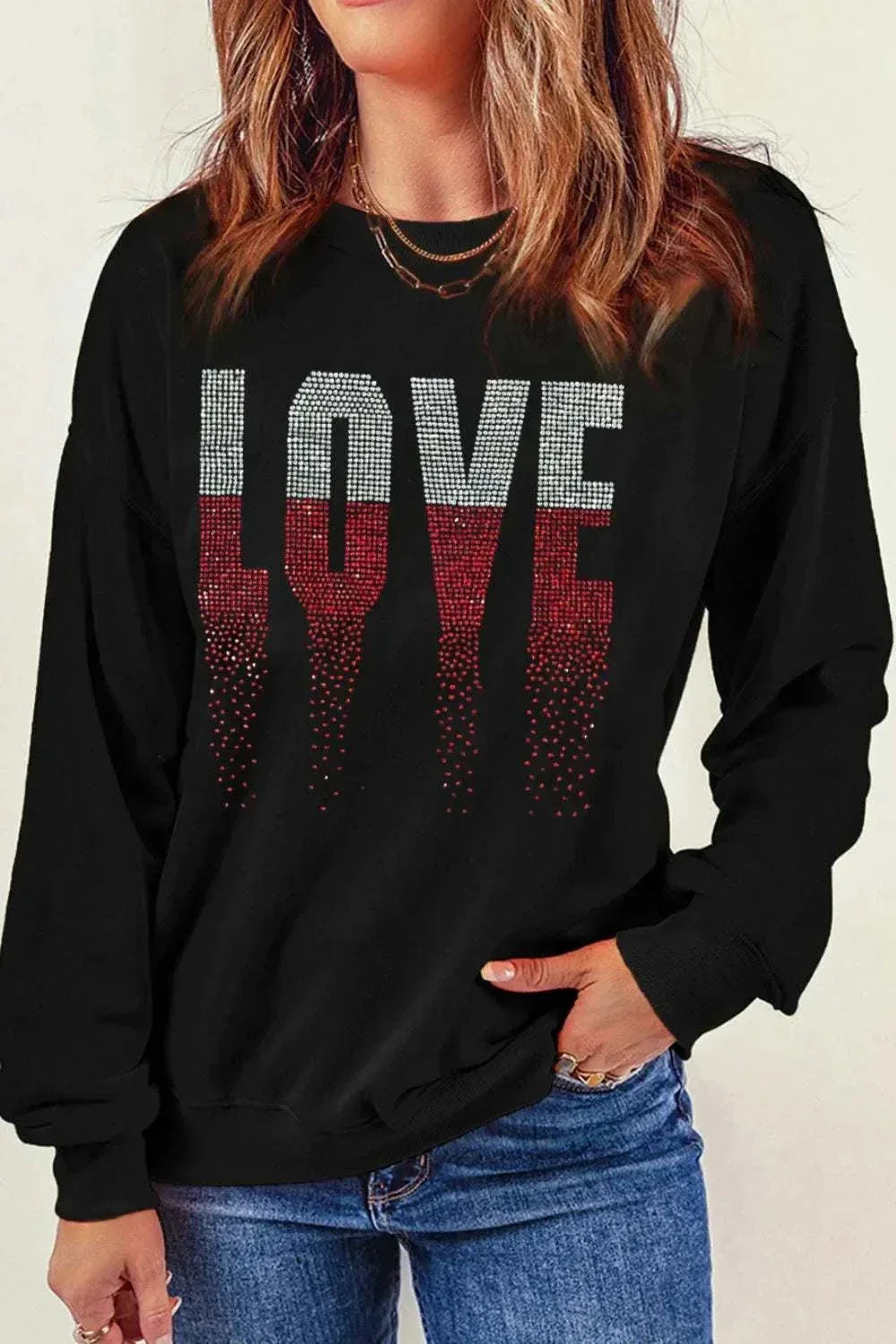 Black Rhinestone LOVE round neck long sleeve sweatshirt made of polyester and cotton blend, slightly stretchy and machine washable.