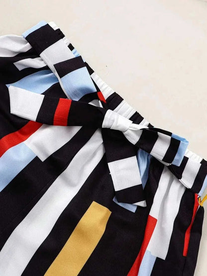 Children's ruffled striped pants with a bow detail from a spaghetti strap top and pants set