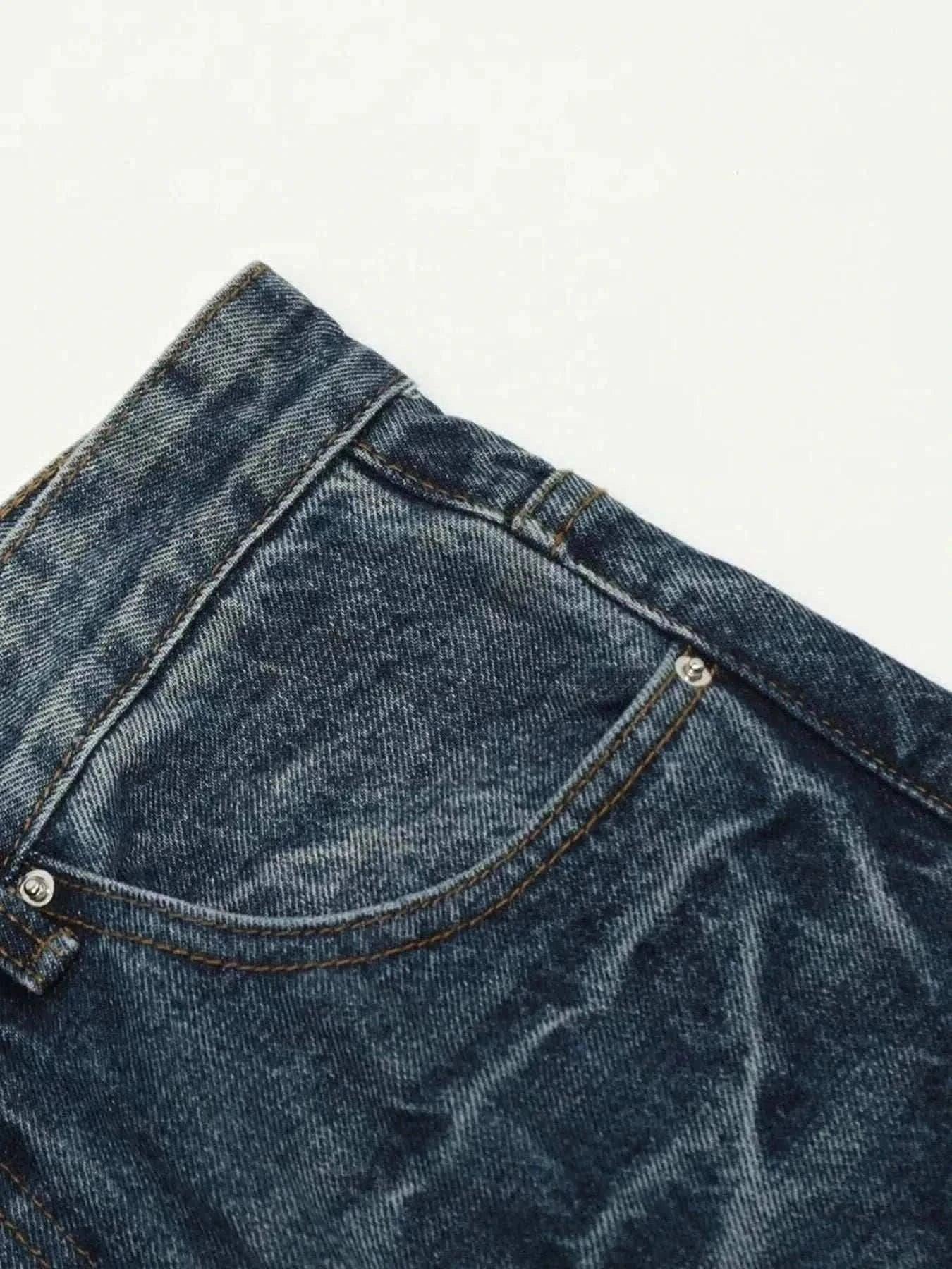 Men's wide leg jeans in washed denim with slightly stretchy cotton blend fabric and cat’s whisker detailing