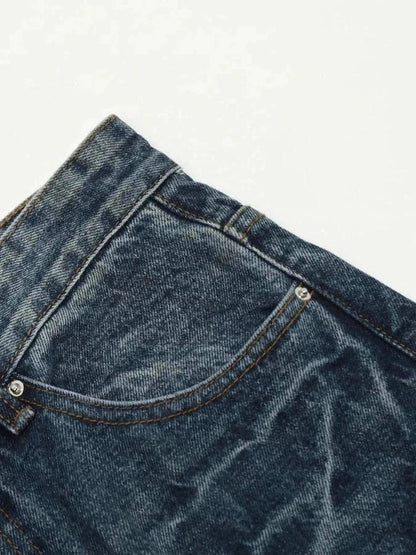 Men's wide leg jeans in washed denim with slightly stretchy cotton blend fabric and cat’s whisker detailing