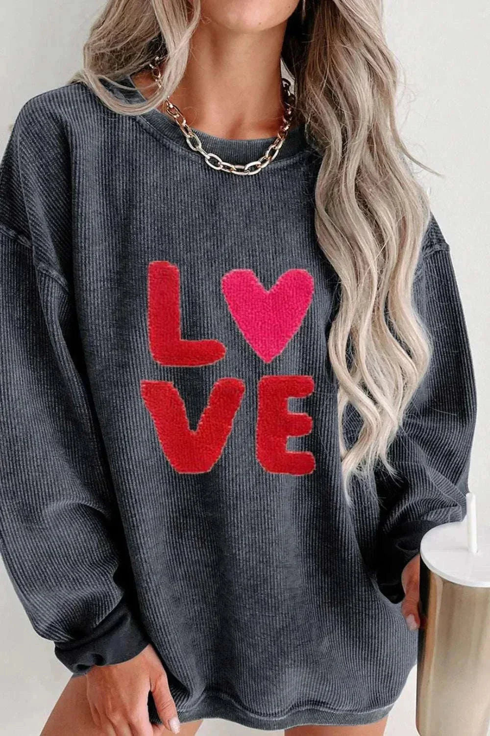 Valentine’s Day LOVE round neck long sleeve sweatshirt with red heart and letters on black fabric