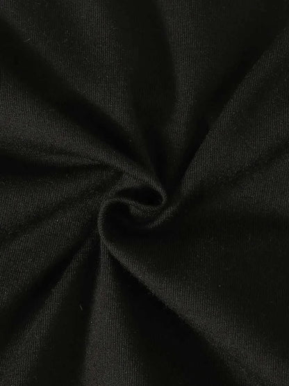 Black polyester and elastane fabric close-up for children's teddy bear round neck top and pants set