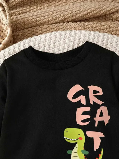 Black children's dinosaur sweatshirt with "GREAT" text and green dinosaur graphic, part of two-piece polyester blend set