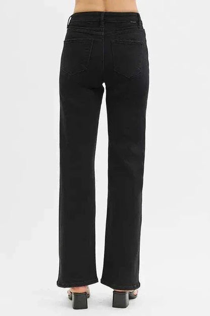 Back view of RISEN Full Size black high rise wide leg jeans for plus size with pockets and slight stretch