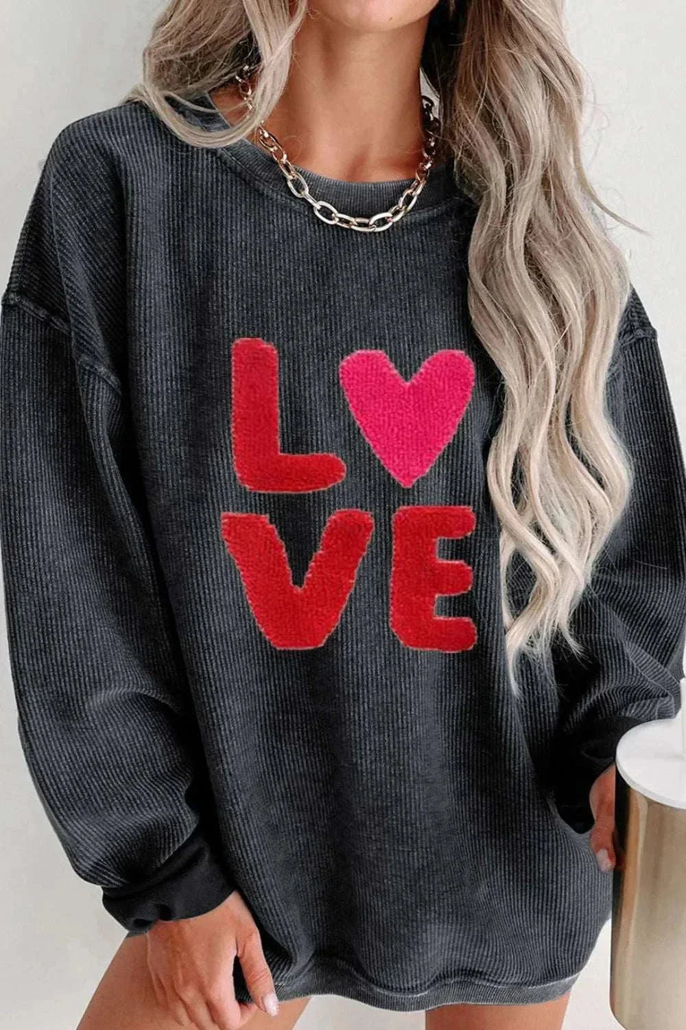 Valentine’s Day LOVE black round neck long sleeve sweatshirt with red and pink heart design