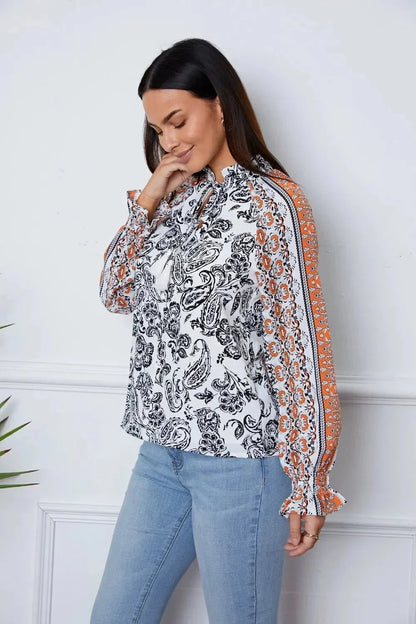 Tassel Tie Neck Printed Smocked Long Sleeve Blouse - VILLA FASHION