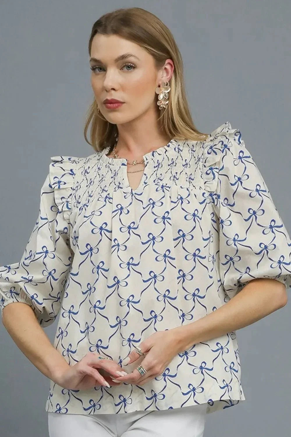 Umgee Ruffled Bow Print Notched Blouse - VILLA FASHION
